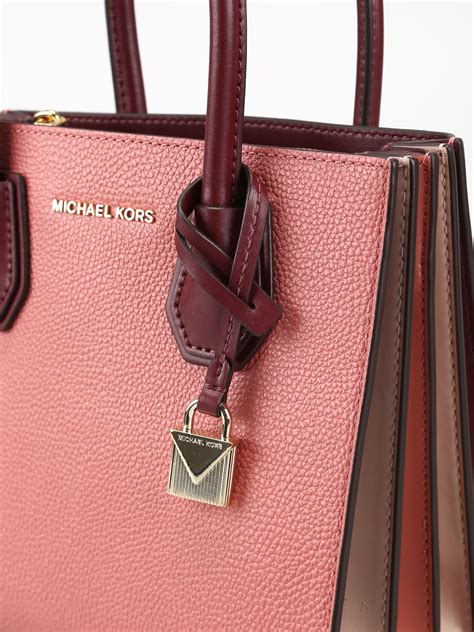 Michael Kors accordion bags